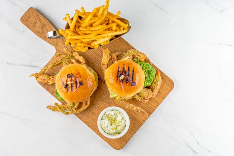Smoked turkey club sandwich with fries